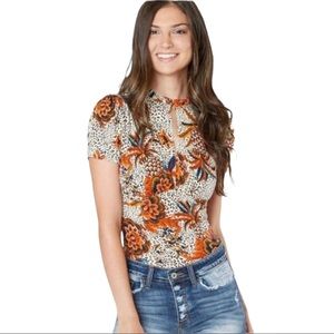 Free People Hear Me Roar Mixed Print
Keyhole Top Size Medium